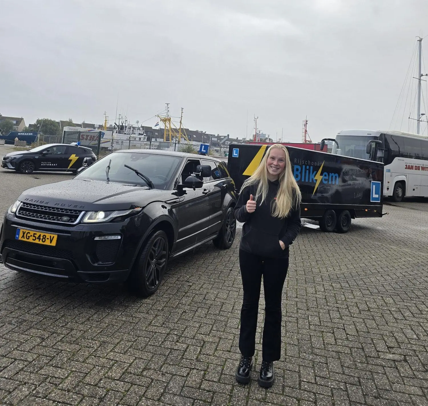 Happy Student with Rijschool Den Helder Vehicle